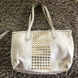 Fossil tote, ivory with gold studs